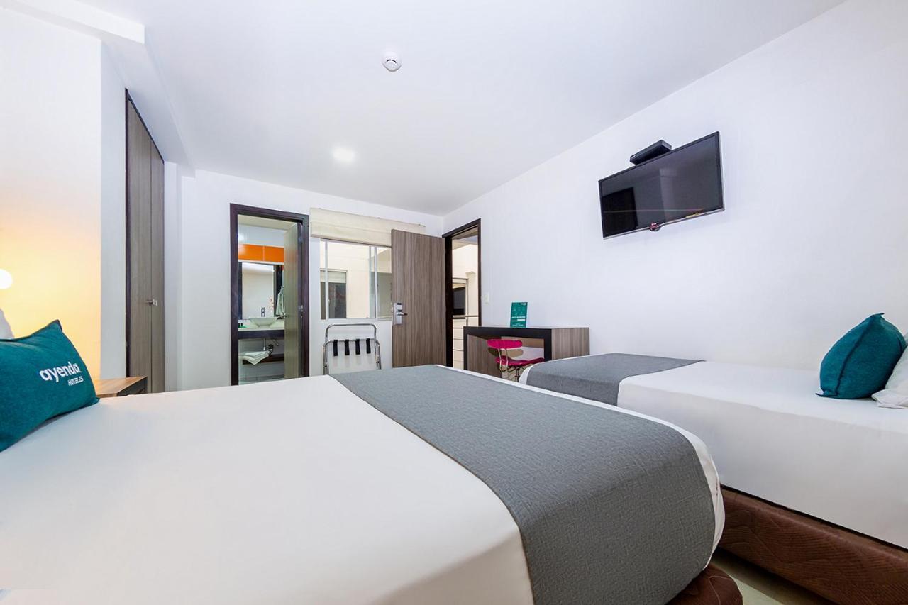 Ayenda 1136 Mh Hotel Pereira Bagian luar foto